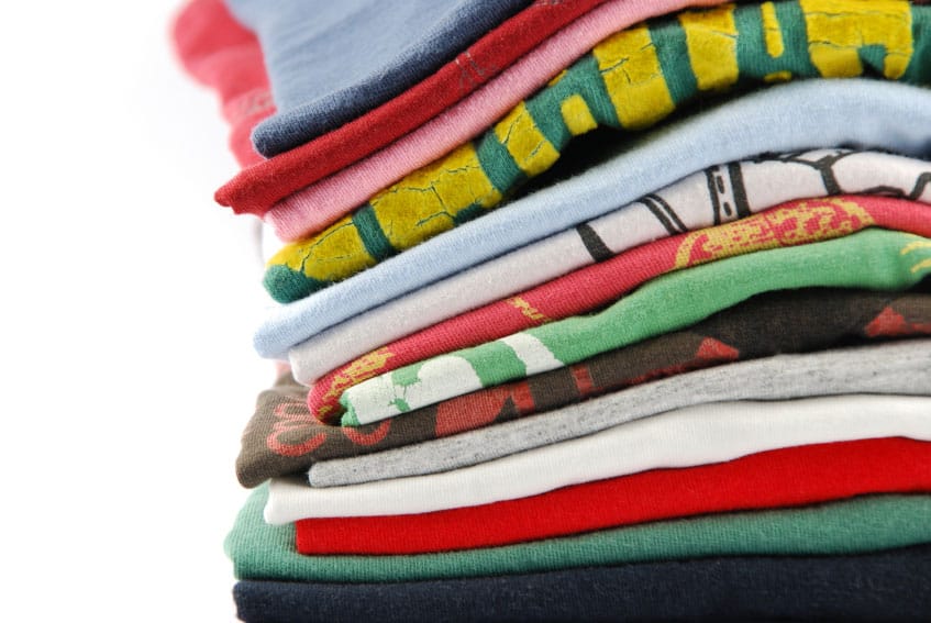 pile of folded colourful t-shirts